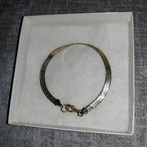Simple gold colored bracelet